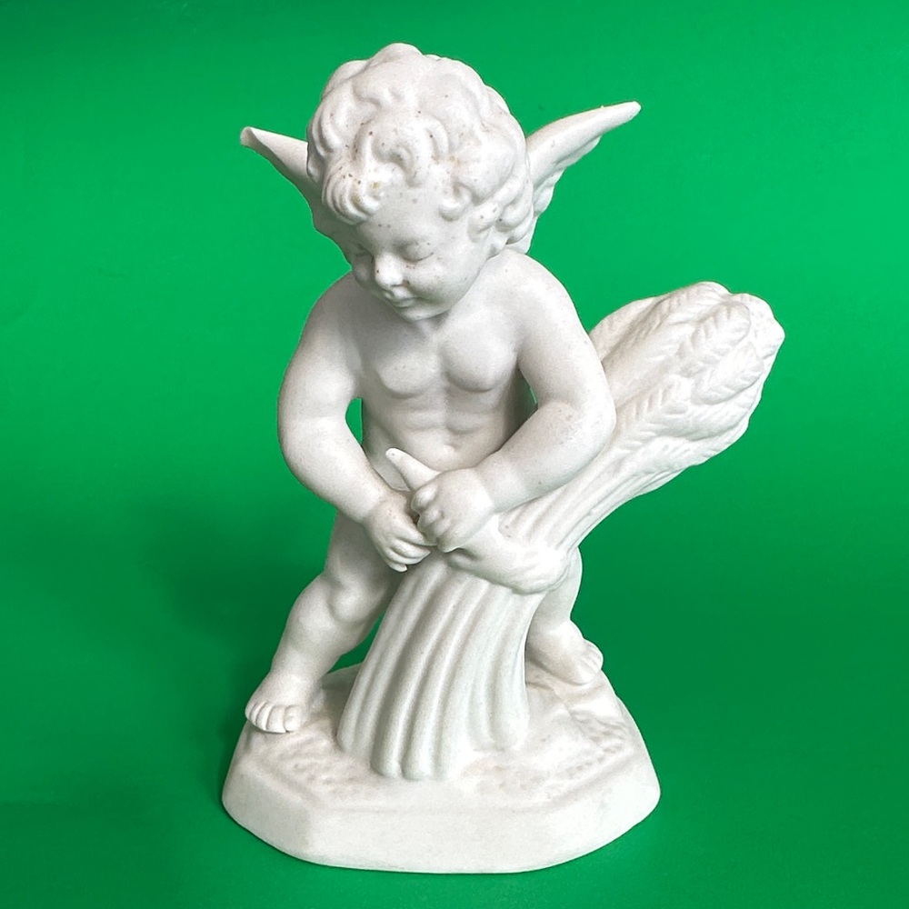 Elegant White Cherub Figurine